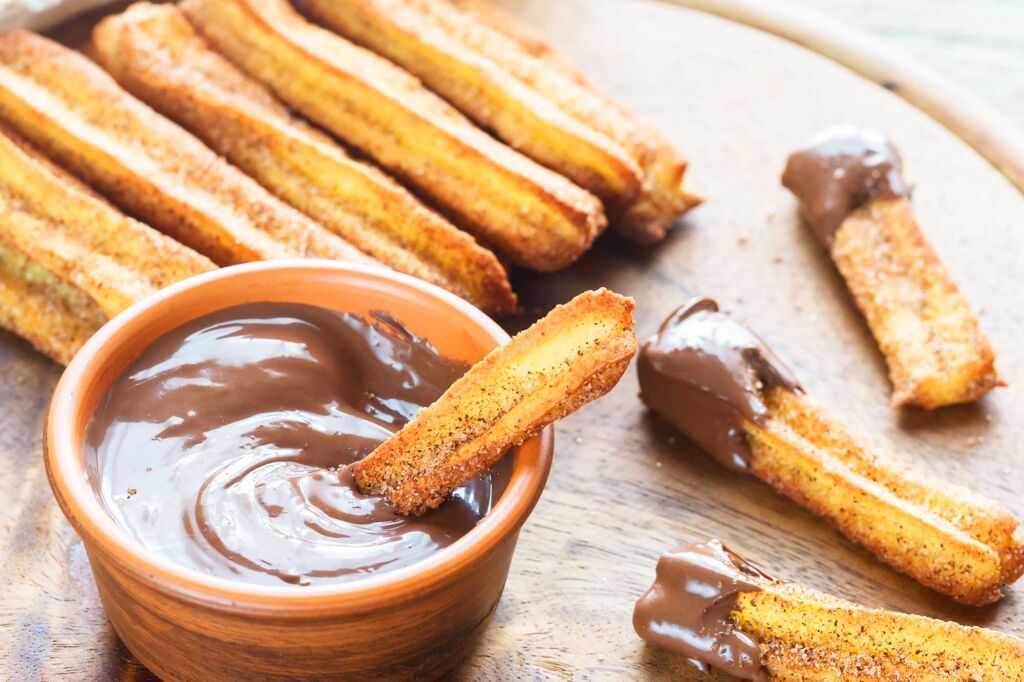 Churros, The Spanish Fried Dough With Chocolate Sauce